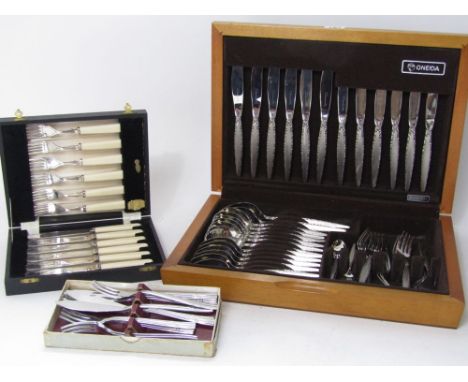 Oneida canteen of vintage cutlery together with two further cutlery sets