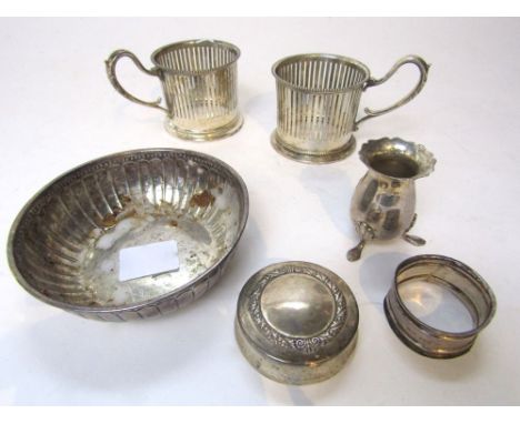 Mixed collection of 830 silver to include a fluted bon bon dish, two pierced cups, napkin ring, a baluster pepper and trinket