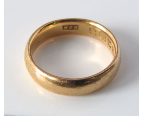 A 22ct gold wedding band hallmarked for Birmingham, size K, 5g