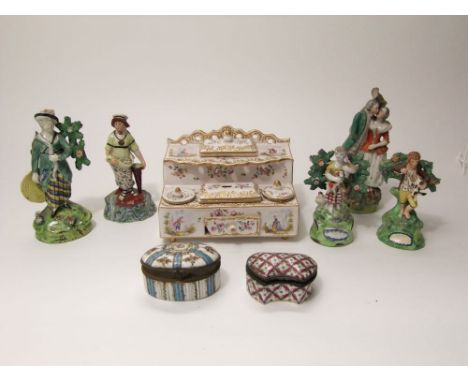 An early 19th century Staffordshire Walton figure of a lady archer with impressed mark Walton to reverse, 18cm tall, together
