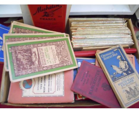 A box containing a quantity of vintage Ordnance Survey maps and guides including examples by Bartholomew's, Ward Lock & Co il