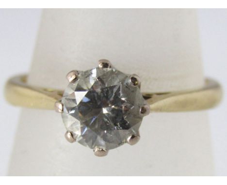 An 18ct gold claw set solitaire diamond ring, 3.5g, size M, diamond 1.1ct approx