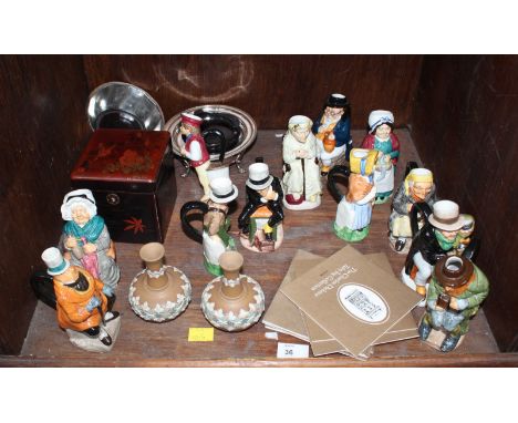 SECTION 36. A shelf of assorted ceramics including Woods and Franklin Mint Toby jugs, a Japanese lacquer tea caddy and other 