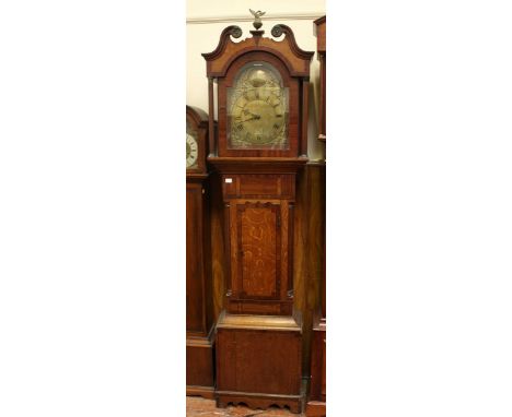 An 18th century oak 30 hour long case clock by Thomas Sharpe of Laghton, the arched brass dial with scrolled spandrels, withi