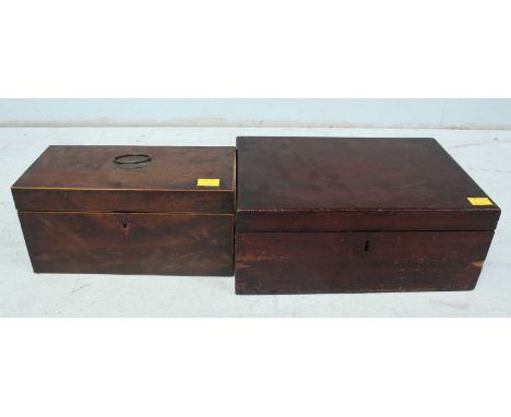 A Georgian mahogany tea caddy with two interior caddies, together with a mahogany writing box, lacking interior. (2)