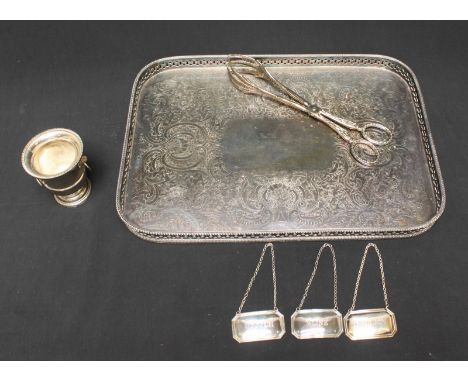 Three silver wine labels for Scotch, Brandy and Wine, together with a silver-plated drinks trays, tongs etc.