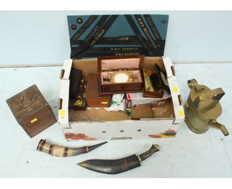 A collection of assorted items including a kukri knife and other blades, military buttons, a board mounted with Royal Navy sh