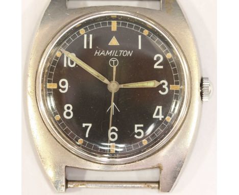 A Hamilton military issue stainless steel wrist watch, c.1973, the black dial with Arabic numerals & tritium luminous markers