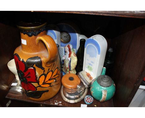 SECTION 51.  A shelf of assorted glass and ceramics, including a Mickey Mouse toy, various children's books, silver plated it