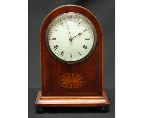 An Edwardian mahogany dome top mantel clock, with white enamel dial and fan inlay. 21 cm high.