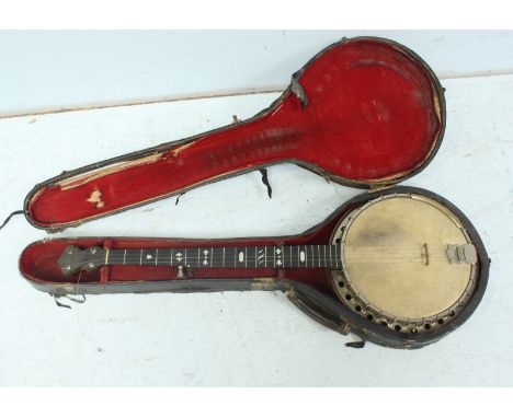 A late 19th century banjo 'The Windsor Pyxe', with mother of pearl inlaid fretboard, in a case.