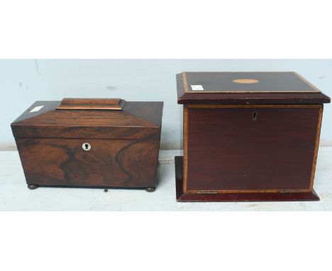 A Victorian rosewood sarcophagus shaped tea caddy, together with an Edwardian mahogany inlaid stationery box. (2)