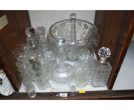 SECTION 28. A shelf of assorted cut glass including a large punch bowl.