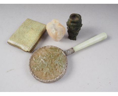 A Chinese carved jade and white metal mounted hand mirror, a carved mother-of-pearl snuff bottle with figure and flower decor
