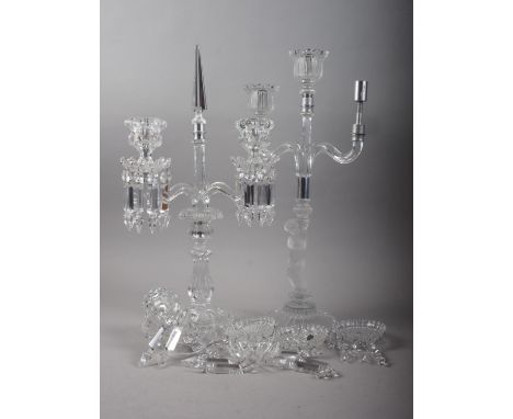 A Baccarat three-light candelabra with frosted putto support, 21 1/2" high, and a Baccarat three-branch candelabrum, 16" high