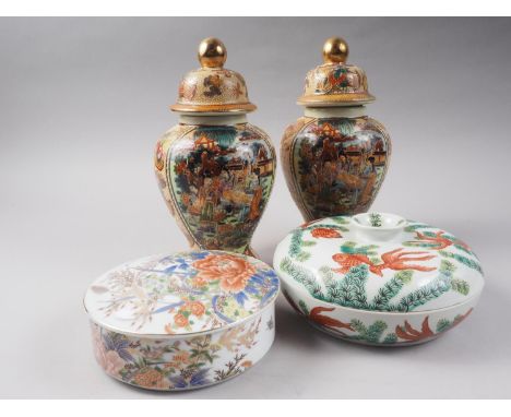 A pair of Satsuma figure decorated jars and covers, 10" high, a Japanese porcelain Imari palette box and cover, 8" dia, a sim