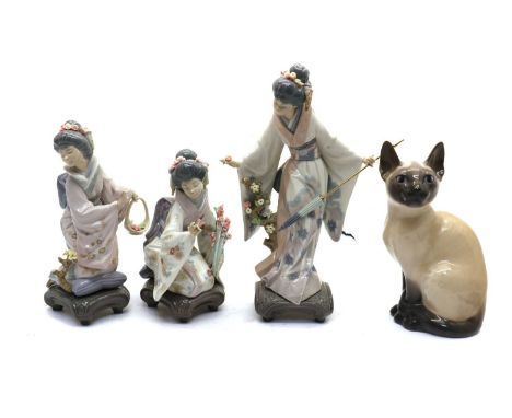 A collection of Lladro porcelain figures,depicting Japanese Geishas, comprising 'Kiyoko', Teruko and Michiko, printed marksta