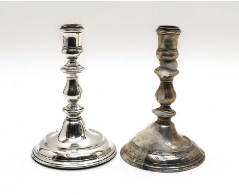 A pair of modern silver candlesticks,by Asprey &amp; Co, London 1956, with baluster knopped stems, on weighted circular bases