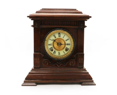 A Ansonia Clocks Co mantel clock,20th century, the caddy top above an enamel dial with roman numerals and gilt metal detail, 