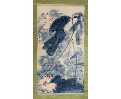 A Chinese hanging scroll,20th century, painted with lotus and leaves, with a dedication and signature of Zhang Daqian (1898-1