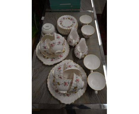 A Royal Doulton Rosell pattern (H4976) double tea service for twelve, (one sugar basin)Please note that all lots are second h