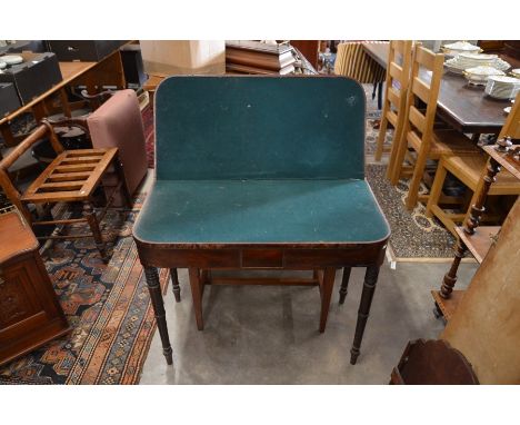 A 19th century mahogany crossbanded card table, the folding top with baize lined interior, raised on turned supports, 90 cm w