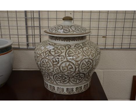 An Indo Chinese design large vase and cover painted with scrolling foliate design, 37 cm high overallPlease note that all lot