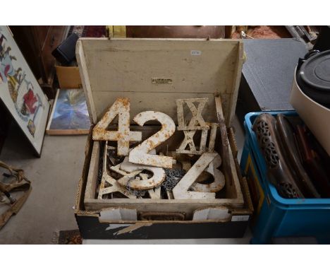 An unusual collection of painted metal numerals (Roman and Arabic), possibly from a floral clock in painted wooden boxPlease 