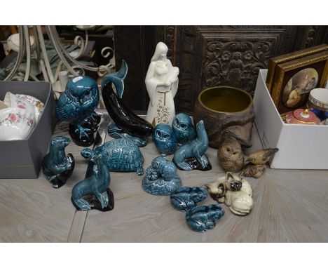 A quantity of Poole pottery blue glazed animals including owl, tortoise, otters, seals, frogs etc to/w a figure 'Eleanor' and