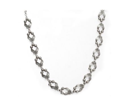 DANISH SILVER BRACELETformed by elliptical links, with A&K STERLING DENMARK to the clasp, 16.8g; along with a Scandinavian ne