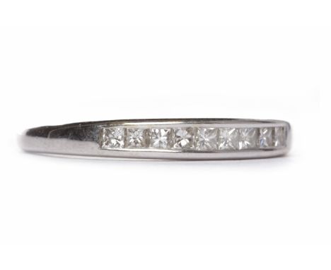 HALF ETERNITY RING the channel set princess cut diamonds totalling approximately 0.45 carats, unmarked, size K, 2.5g