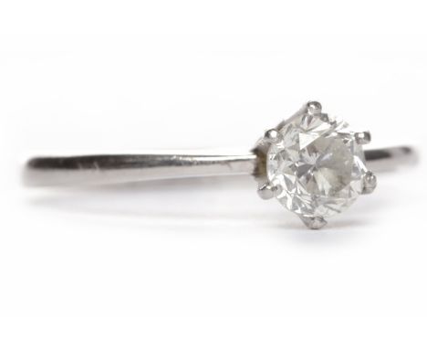 DIAMOND SOLITAIRE RINGthe six claw round brilliant cut diamond in an unmarked setting, size K, 2.1g