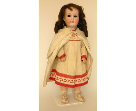 Heubach Koppelsdorf 250 bisque head  doll,  German 1910, with weighted brown glass eyes, open mouth, upper teeth and brown ha