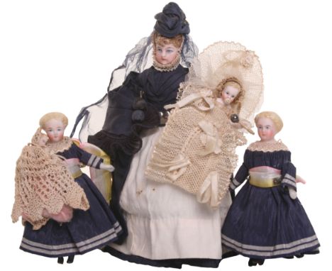 Three German bisque head Dolls House dolls, all with painted features and moulded hair on cloth bodies with bisque lower arms