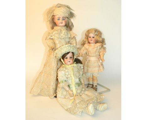 A.M 390 bisque head doll, with fixed brown glass eyes, open mouth and blonde wig, on a fully jointed wood and composition bod