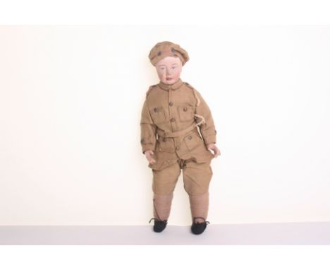 Rare English Goss WWI soldier doll, the pottery shoulder head boy with painted features and moulded brown hair and cloth body