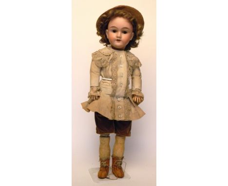 Max Handwerck bisque head doll, German circa 1910, with weighted brown glass eyes, open mouth, upper teeth and original brown