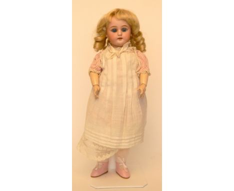 Simon & Halbig 1078 bisque head doll, German circa 1910, with weighted blue glass eyes, open mouth, upper teeth and blonde ha