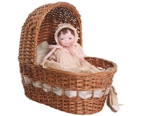A Grace S. Putnem Large all-bisque ‘Bye-Lo baby’,  German circa 1920 with weighted brown glass eyes, closed mouth and open cr