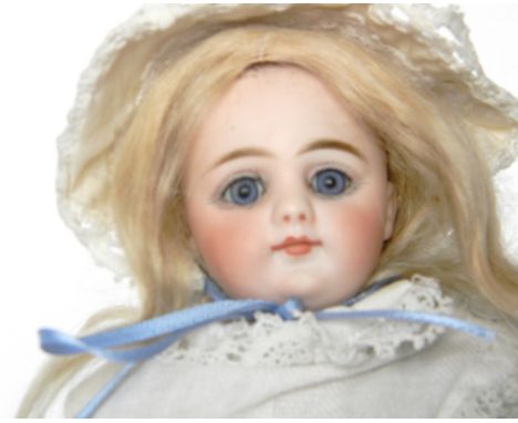 Simon & Halbig 950 bisque shoulder head doll, German 1870, with fixed blue glass eyes, feathered brows and closed mouth, blon