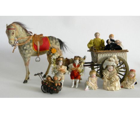 Miniature horse and carriage, horse Bonbonniere and dolls, skin covered pony and wooden cart with decorative embossed sides, 