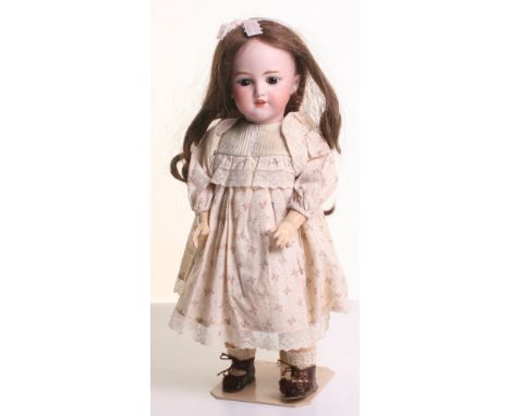 Simon & Halbig 1249 ‘Santa’ bisque head doll, German circa 1910, with weighted brown glass eyes, raised eye brows, open mouth