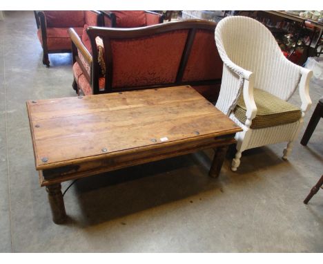 Lloyd Loom Conservatory Chair and a Rustic Coffee Table