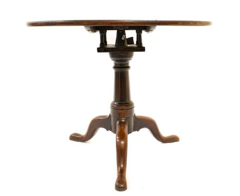 A George III Mahogany Bird-Cage Platform Tripod Table, 3rd quarter 18th century, the circular top on a gun barrel support wit