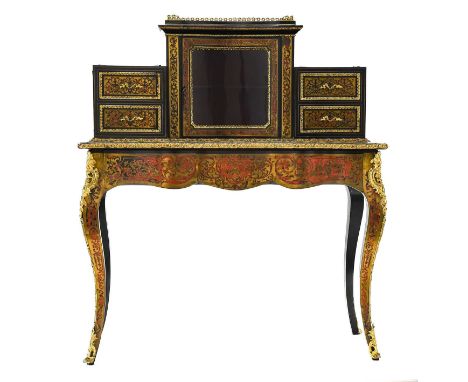 {} A Victorian Ebonised, Red Tortoiseshell and Gilt Metal Mounted Bonheur de Jour, circa 1850, in Louis XV style, the three-q