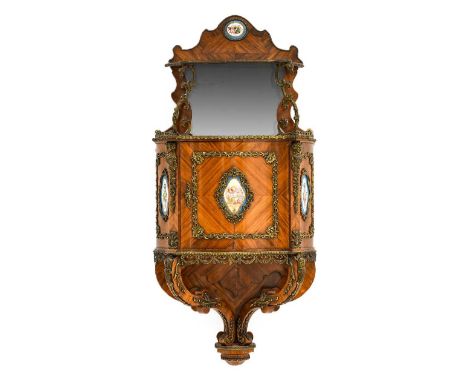 {} A French Louis XV Style Tulipwood and Gilt Metal Mounted Wall Cabinet, circa 1870, the small shelf above a mirrored back, 