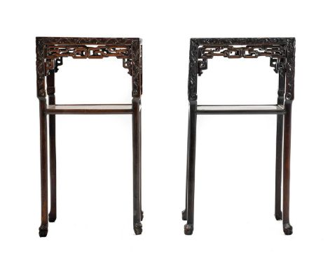 A Matched Pair of Chinese Padouk Wood and Pink Marble Plant Stands, circa 1900, of rectangular form, the acanthus carved fram