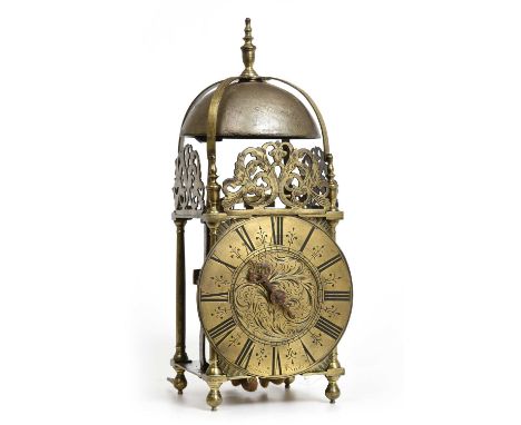 An Early 18th Century Brass Striking Lantern Clock, signed Tho Sparrow, St Neots, circa 1720, four posted case, front and sid