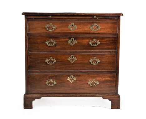 A George III Mahogany and Oak-Lined Bachelor's Chest, circa 1780, the moulded top with re-entrant corners above a pull-out br