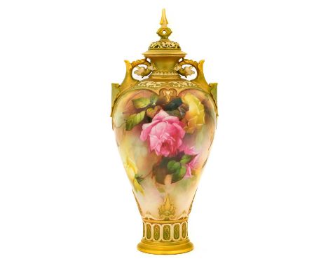 {} A Royal Worcester Porcelain Vase and Cover, 1910, of baluster form with pierced cover and scroll handles, painted with ros